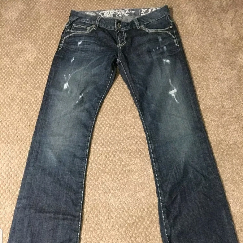 Guess jeans distressed with flap pockets 27x32